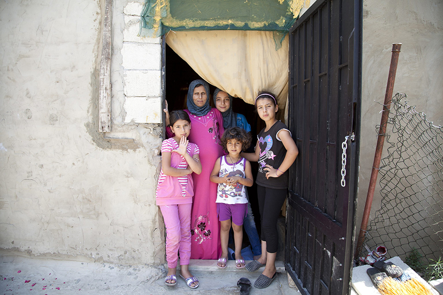 Miram, 11, front right, was eating breakfast in her home in Syria, when a bomb fell on the kitchen and killed her mother. She was brought to her brother’s family outside of Beirut, where she now lives with her cousins, brother and his wife. UNHCR/E.Dorfman (Common Licence FLickr)